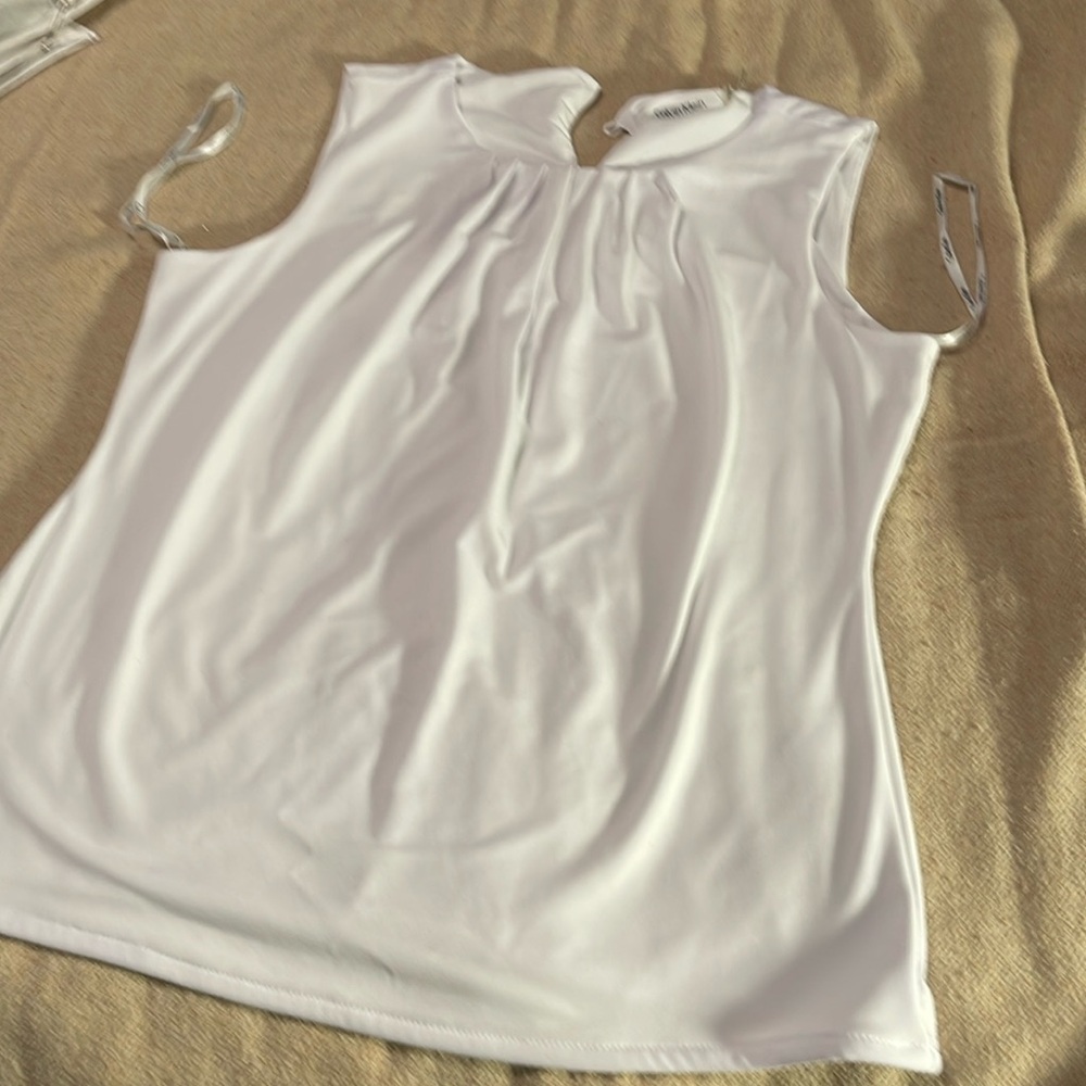 Calvin Klein sleeveless pleat-neck top .